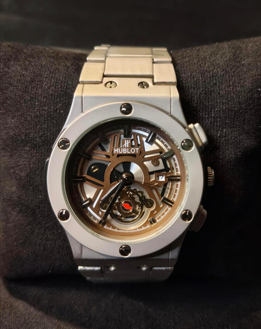 "Hublot-Style Open Heart Stainless Steel Watch with Date Display – Silver & Rose Gold Dial"